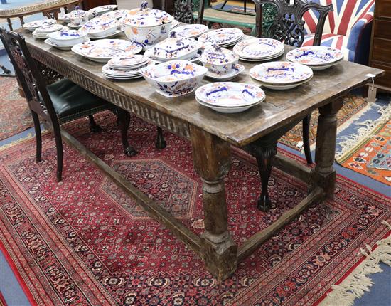 A 17th century style oak refectory table (made up) W.242cm